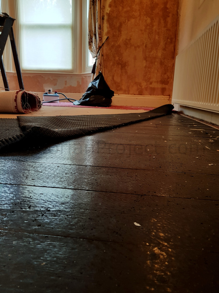 Restoring wooden floorboards